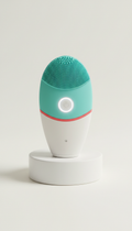 Sonic facial cleansing brush with glow pulse